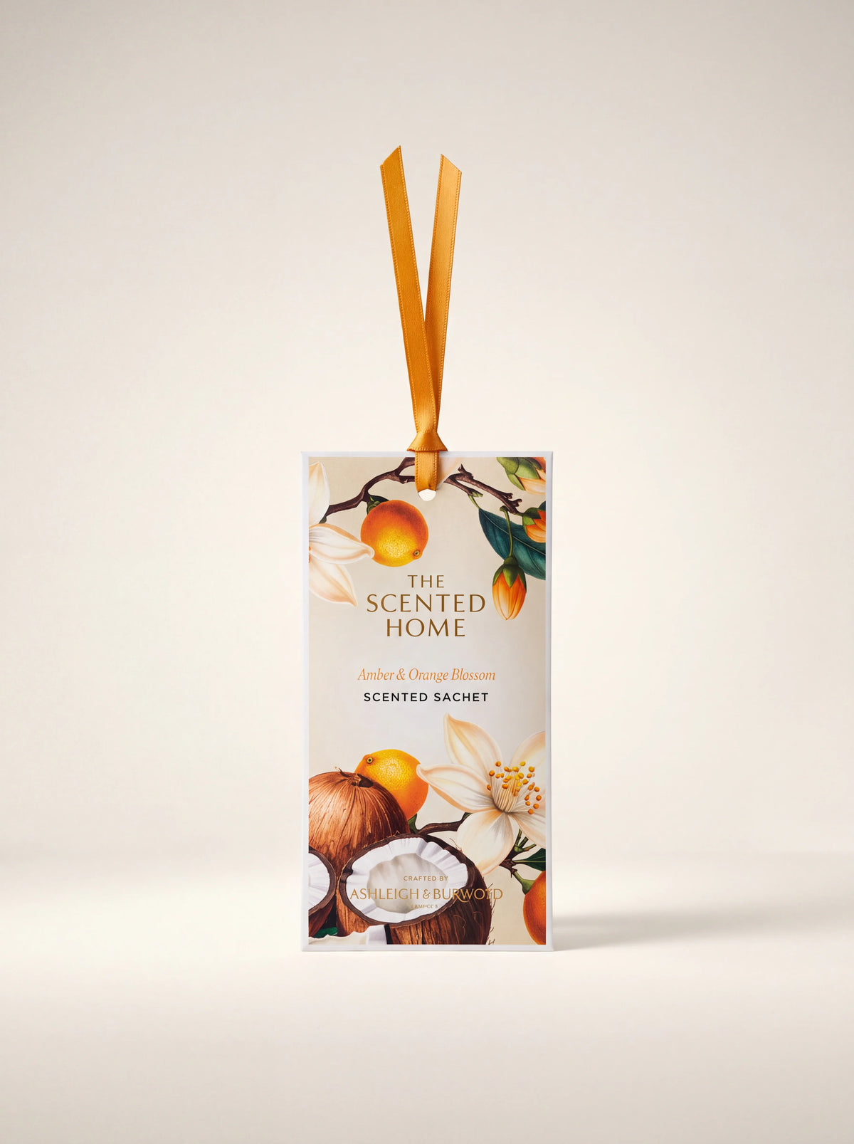 Scented sachet with an orange hanging ribbon, printed with oranges, coconut and white blossom
