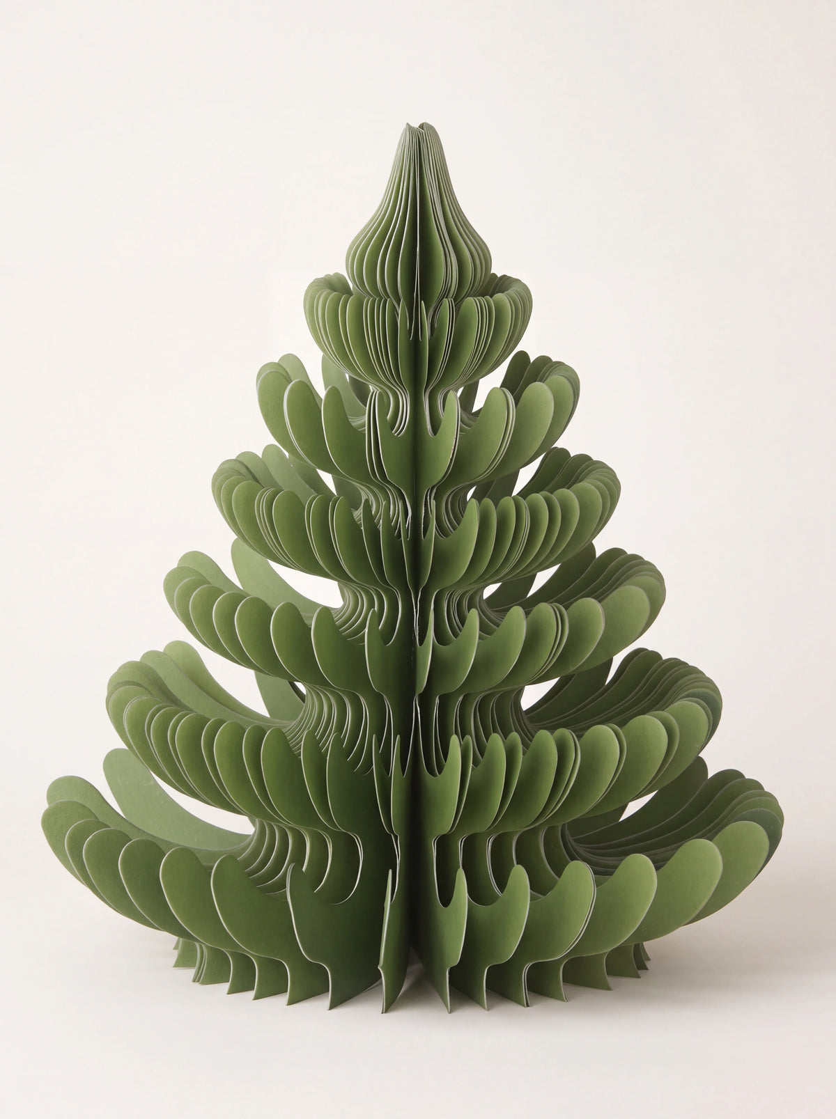Tiered paper honeycomb tree in dark green with curved, layered branches