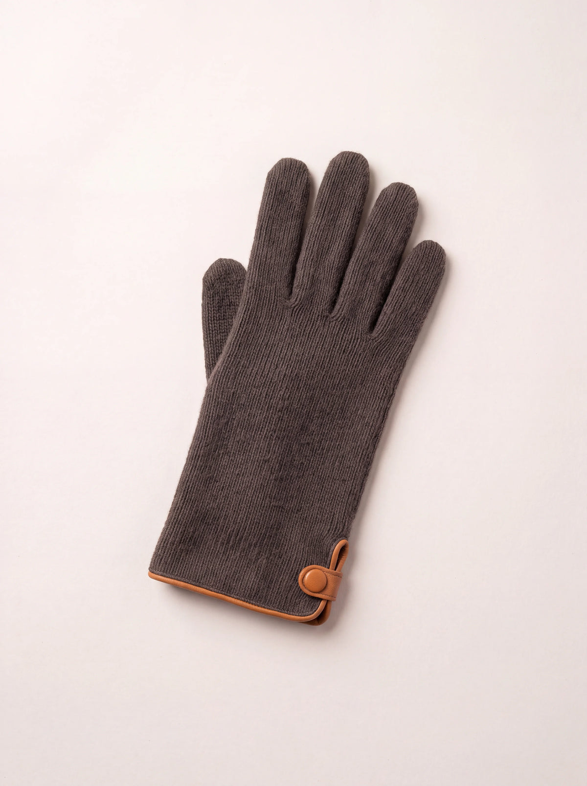 Knitted wool and cashmere glove in dark brown with tan leather piping and a covered press-stud tab at the cuff