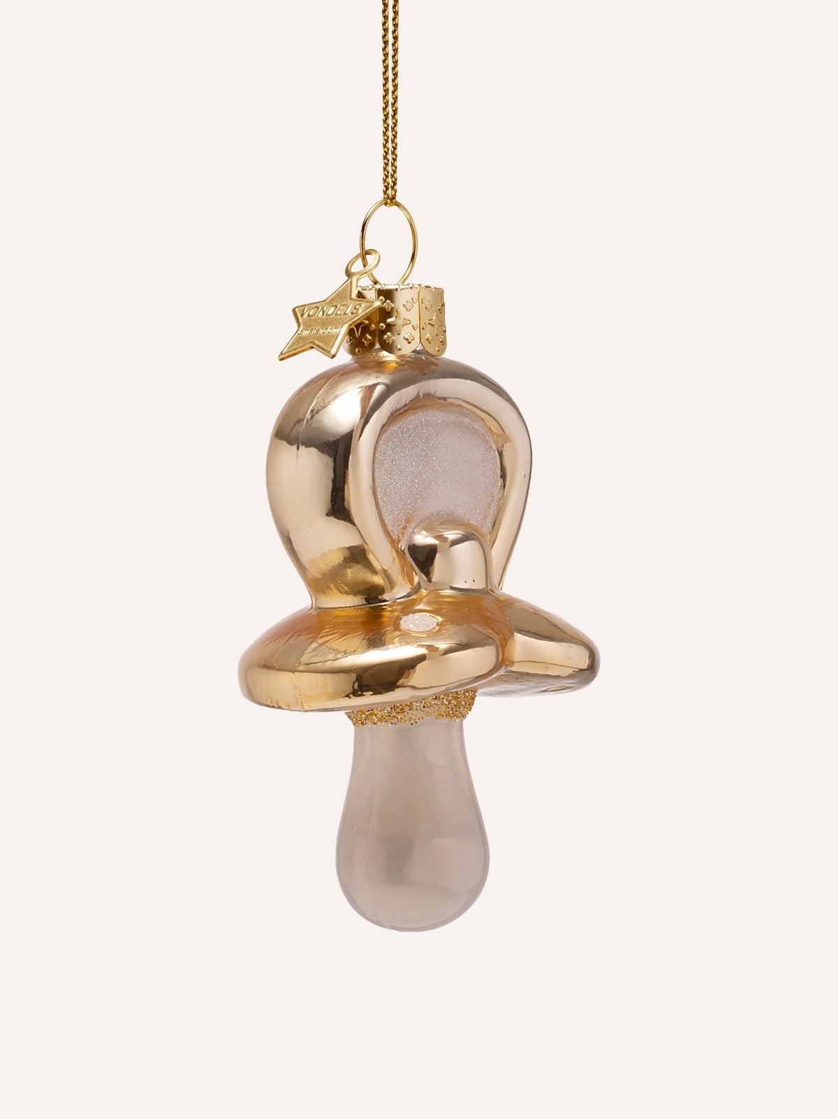 Three-quarter view of the baby pacifier ornament showing the contoured shield and teat
