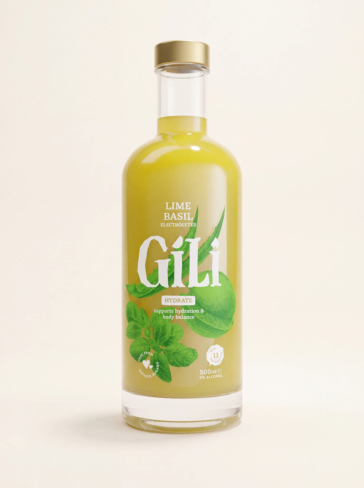 Basil elixir in a 500 ml clear glass bottle with a gold cap, filled with light green liquid