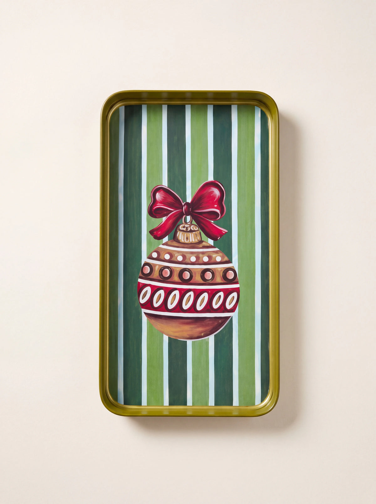 Rectangular iron tray with a raised rim and a hand-painted Christmas bauble on a green striped background