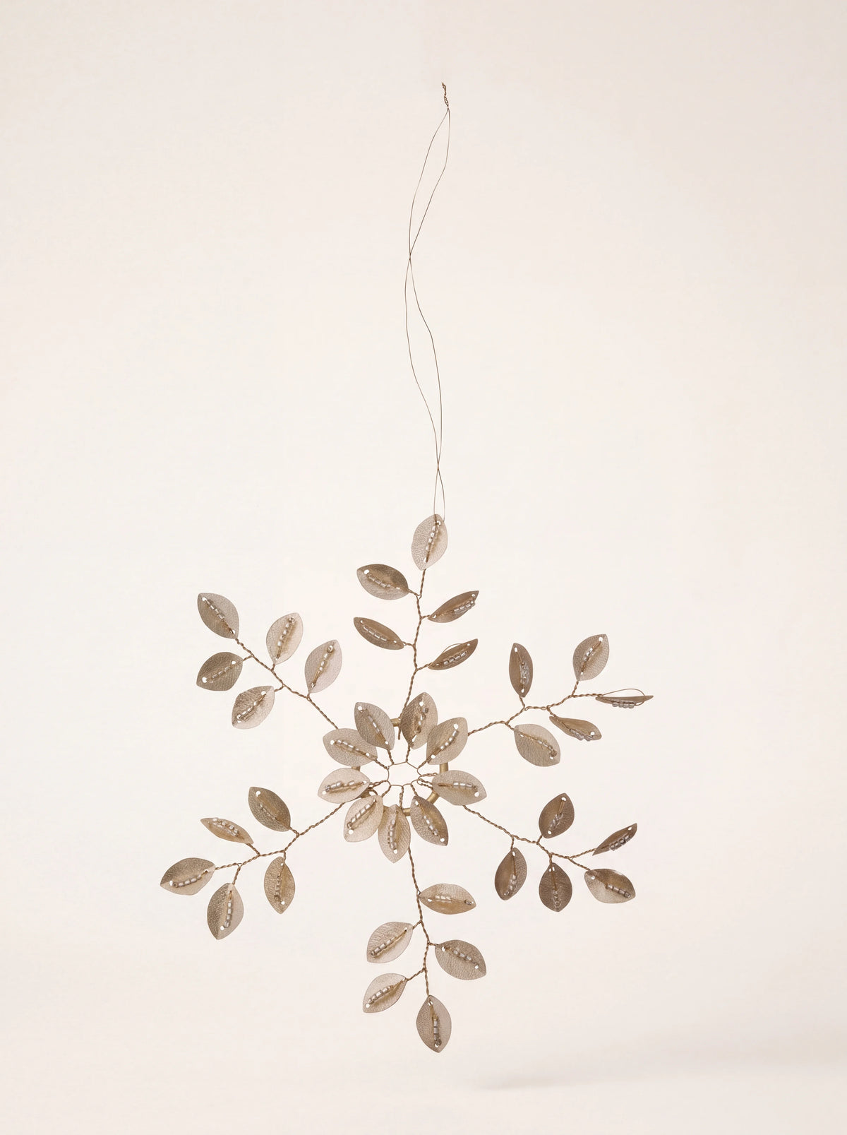 Champagne beaded star ornament with branching wire arms, leaf-shaped sequins and glass beads