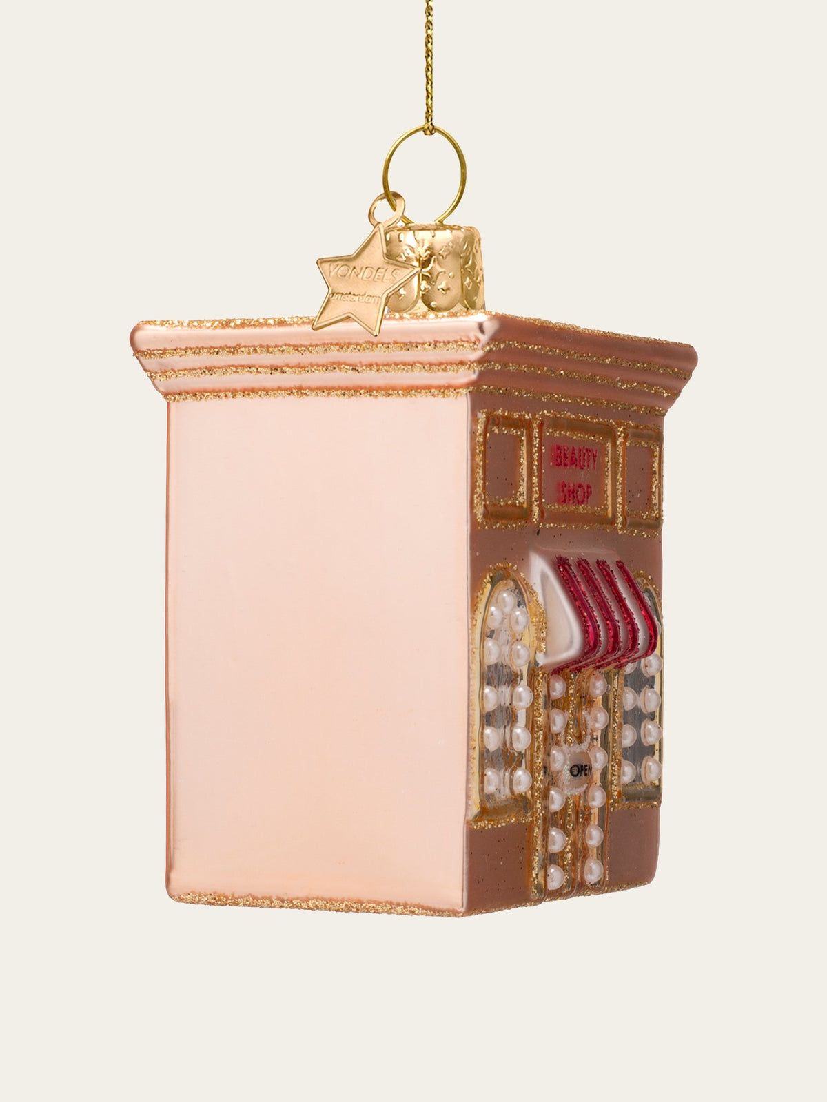 Side angle showing the smooth pink wall and projecting awning