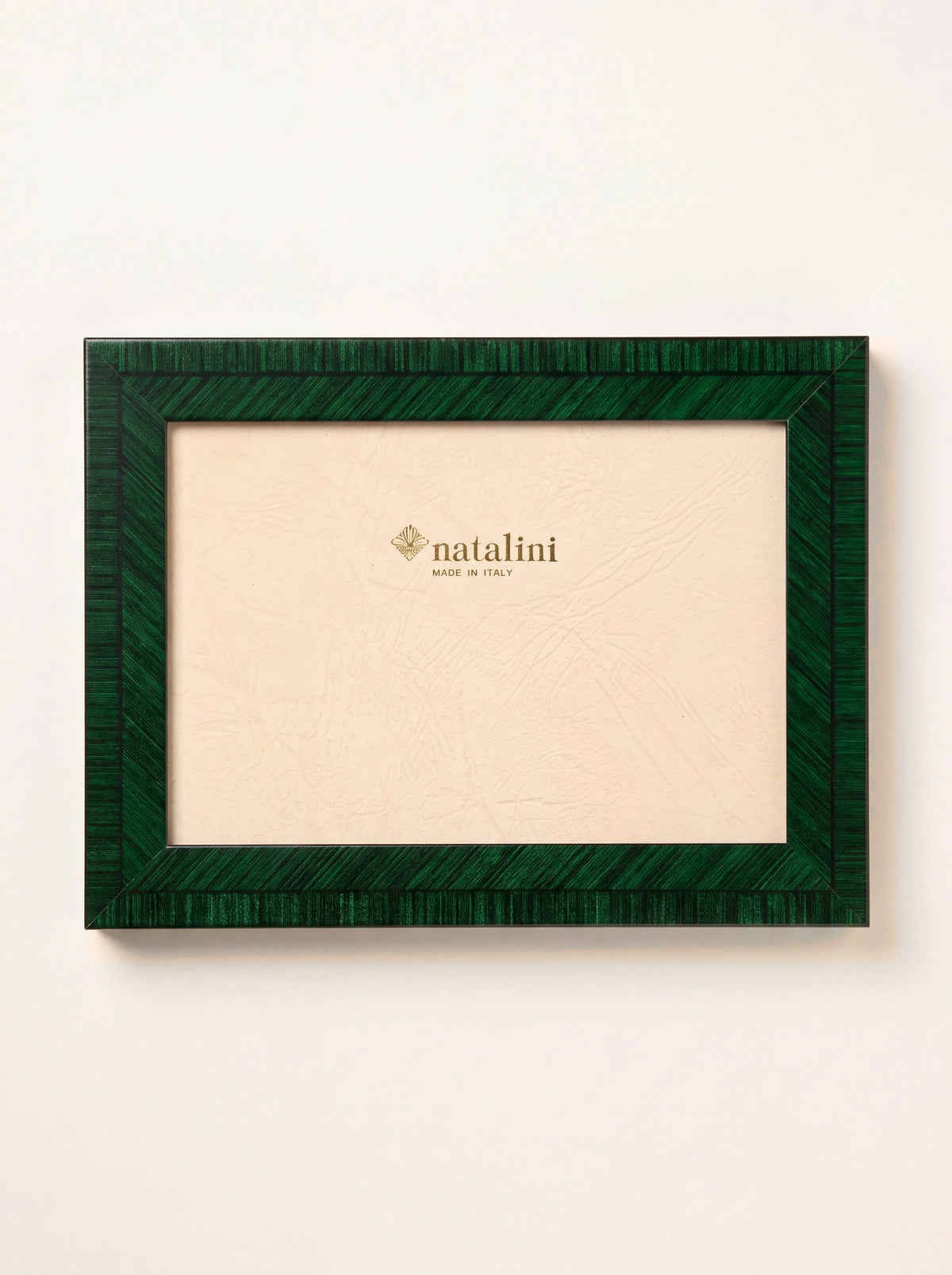 Dark green inlaid wood veneer photo frame in landscape orientation, with insert reading natalini MADE IN ITALY