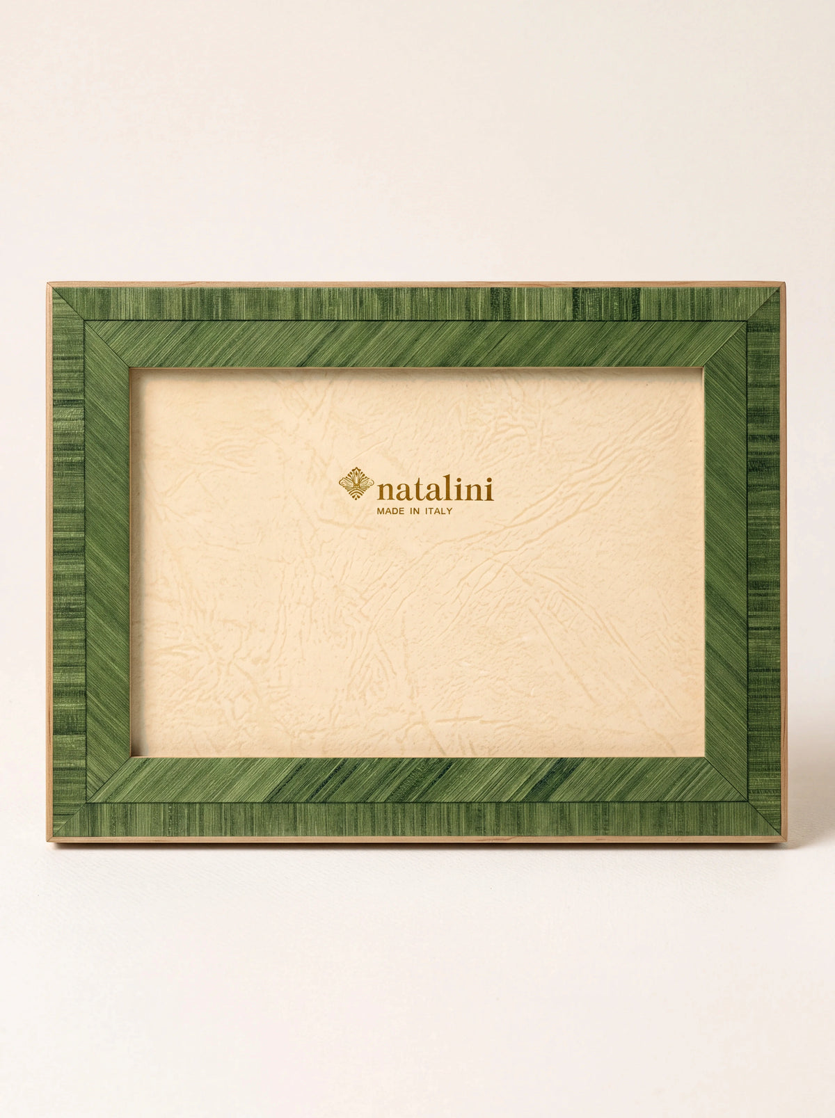 Rectangular meadow green inlaid wood veneer photo frame with a paper insert reading natalini MADE IN ITALY