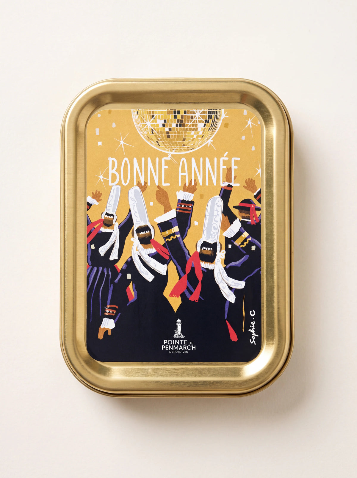 Gold-tone tin of sardines in olive oil with dancing figures under a disco ball and Bonne Année text