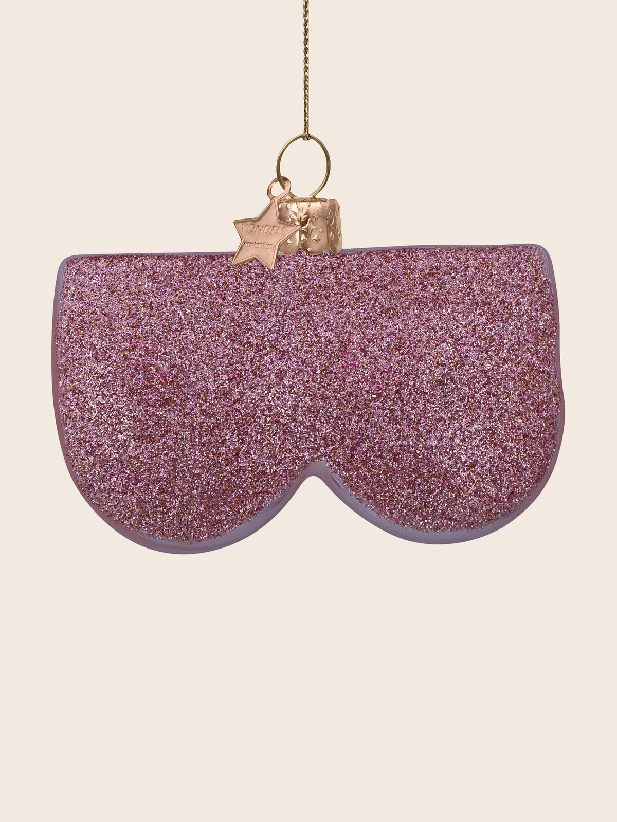 Flat reverse side of the pink glass breast ornament coated entirely in glitter