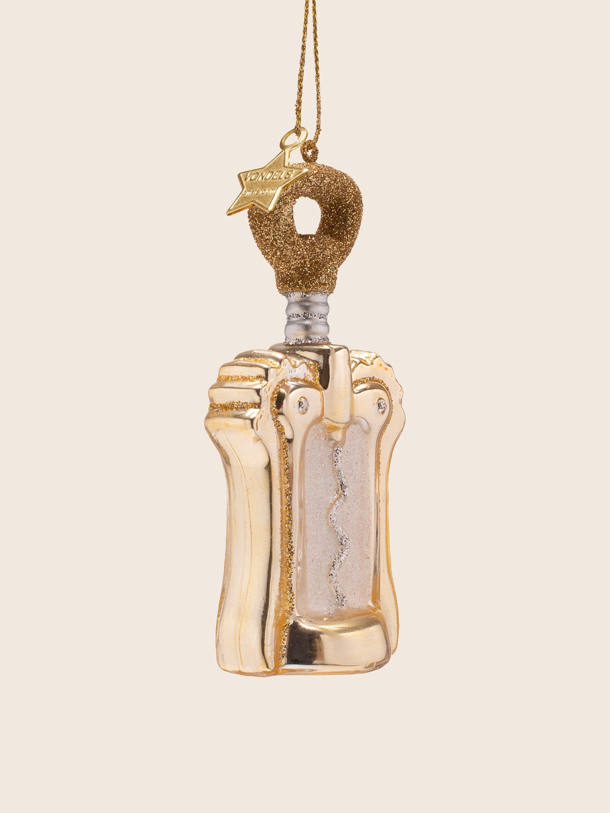 Winged bottle opener ornament angled to show the glitter trim along the raised side wings