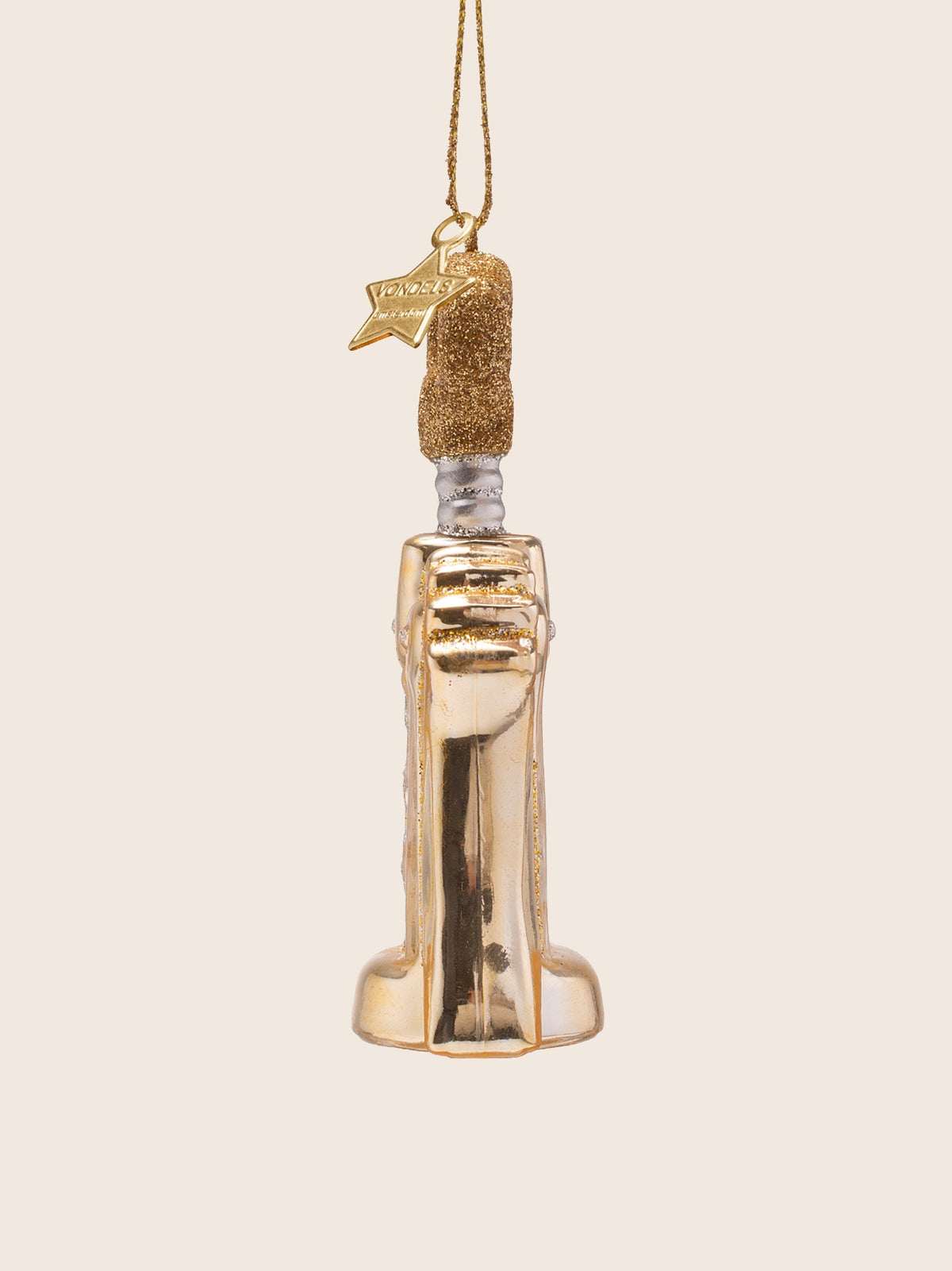 Side profile of the glass ornament showing its thickness and the contoured wing handles