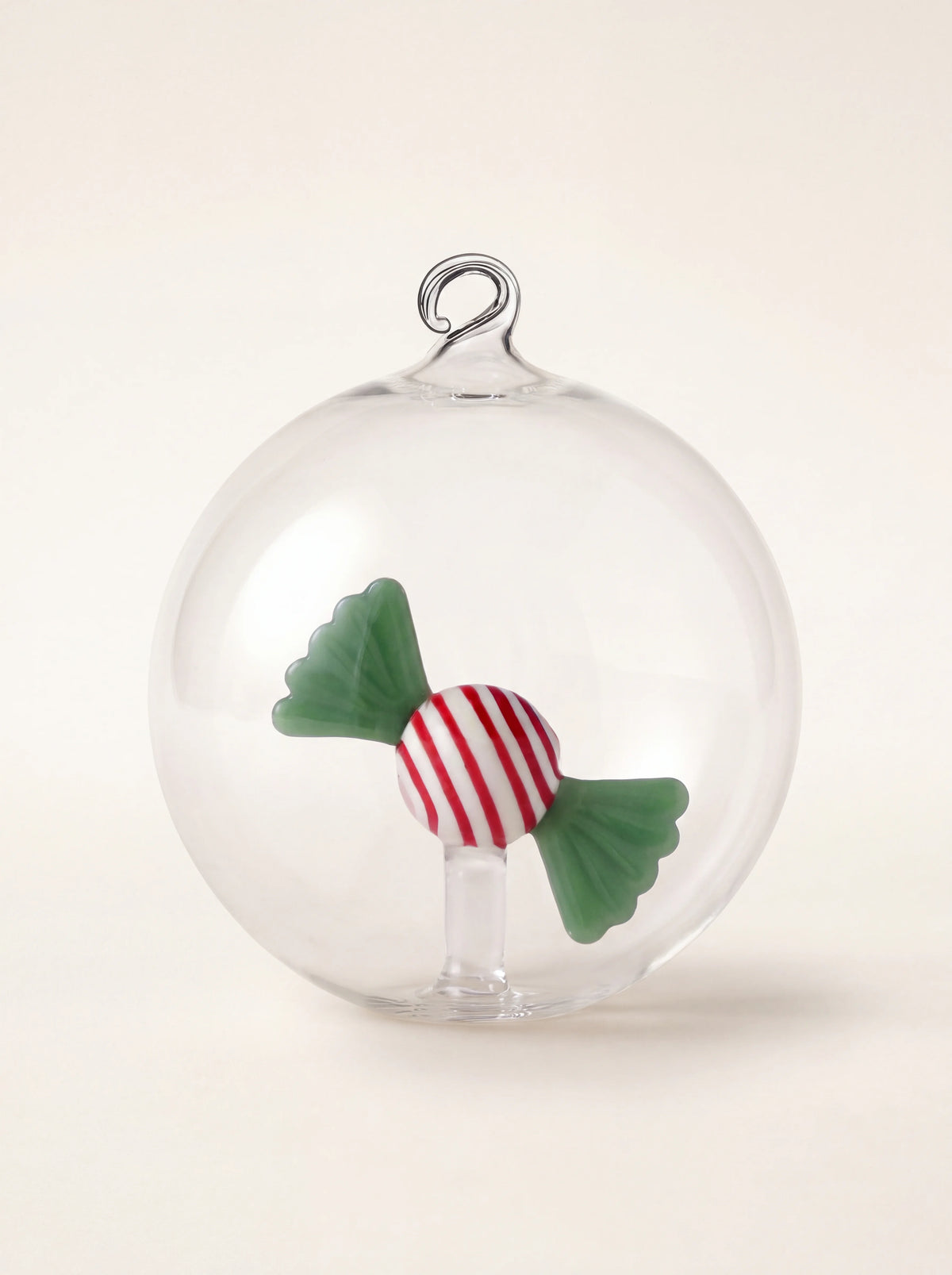Clear borosilicate glass bauble with an internal red and white striped candy and green wrapper ends