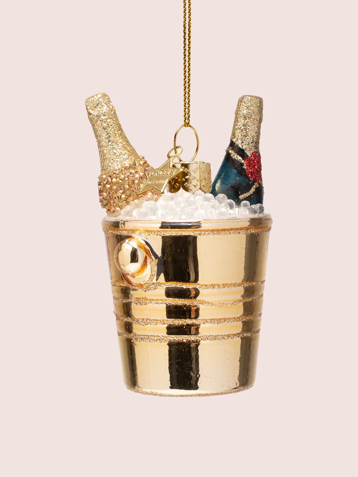 Three-quarter view of the ornament showing the beaded bottle texture and pearlescent ice