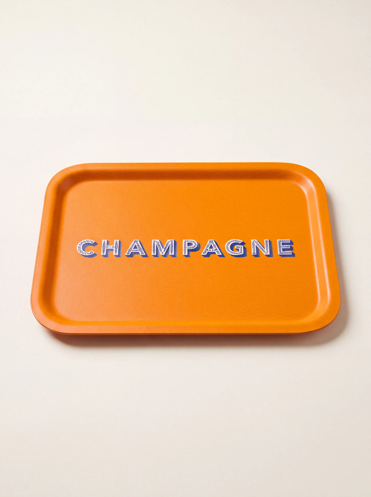 Rectangular orange birch wood tray with a raised rim and blue Champagne lettering in the centre