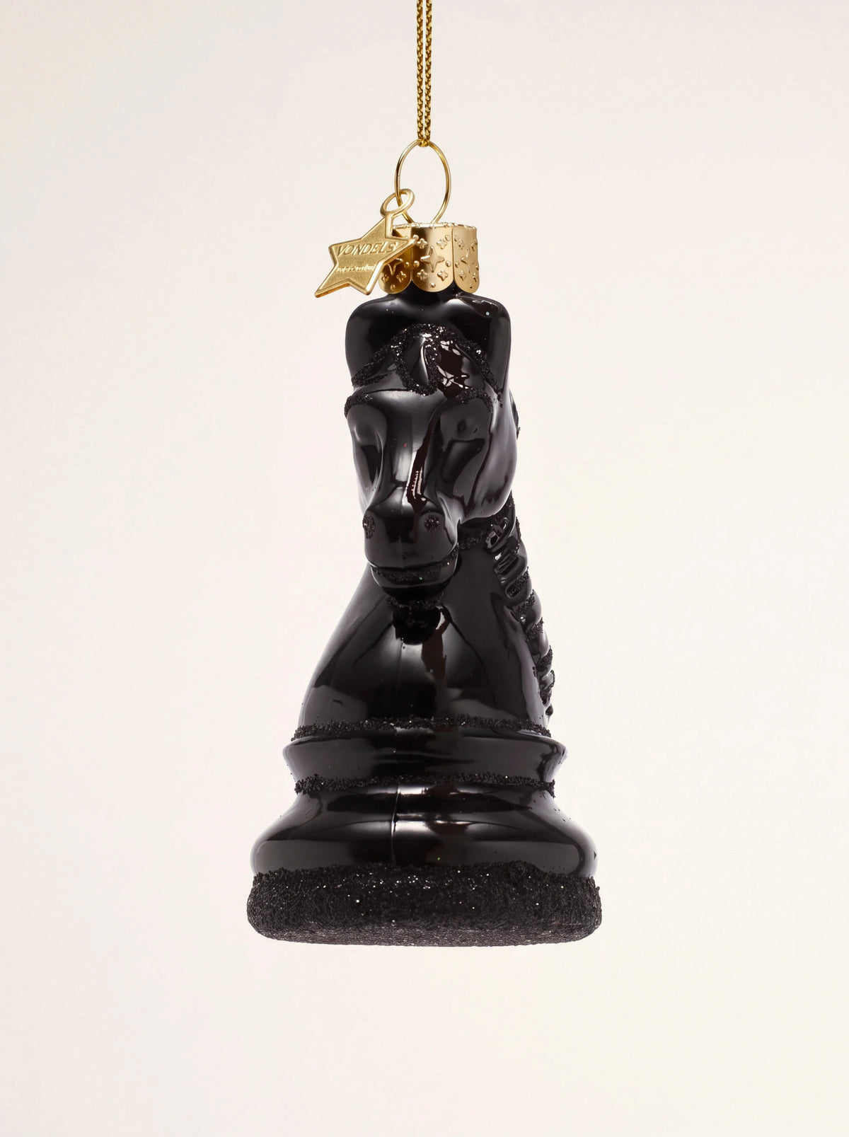 Glossy black glass chess knight ornament with black glitter trim and gold hanging cap