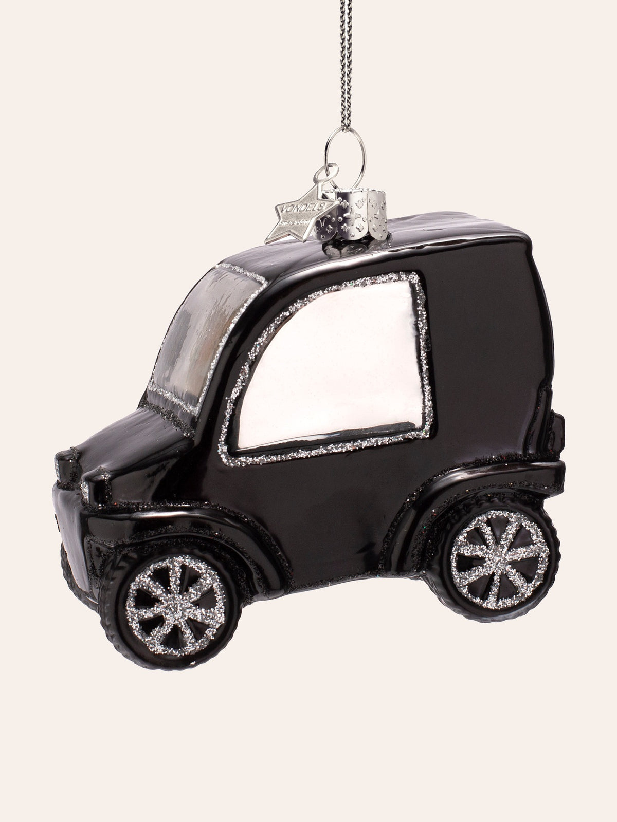 Left-facing view of the city car ornament showing the front bumper, windscreen and silver hanging loop