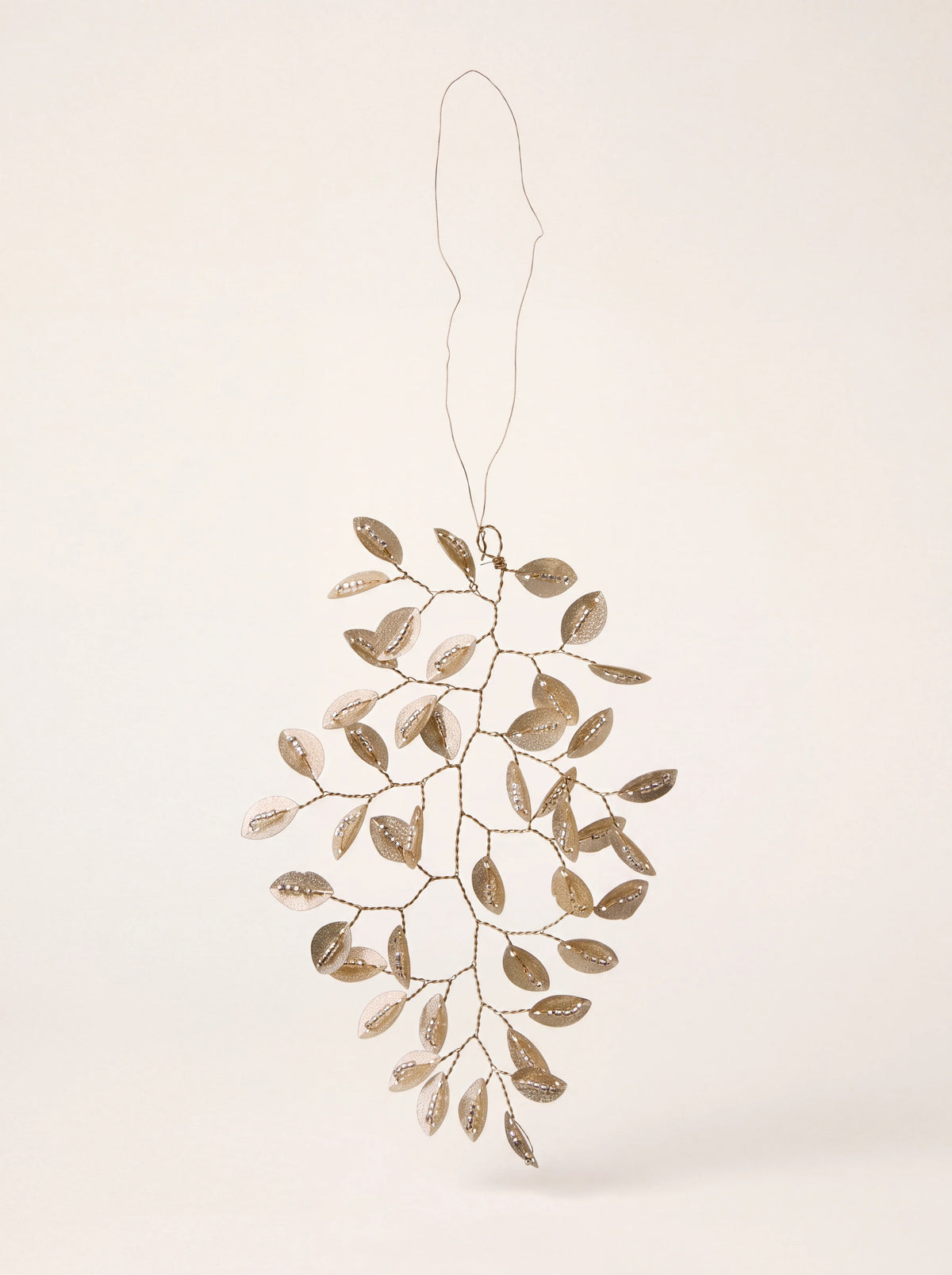 Champagne metal twig ornament with beaded leaves, wire branches and a hanging loop