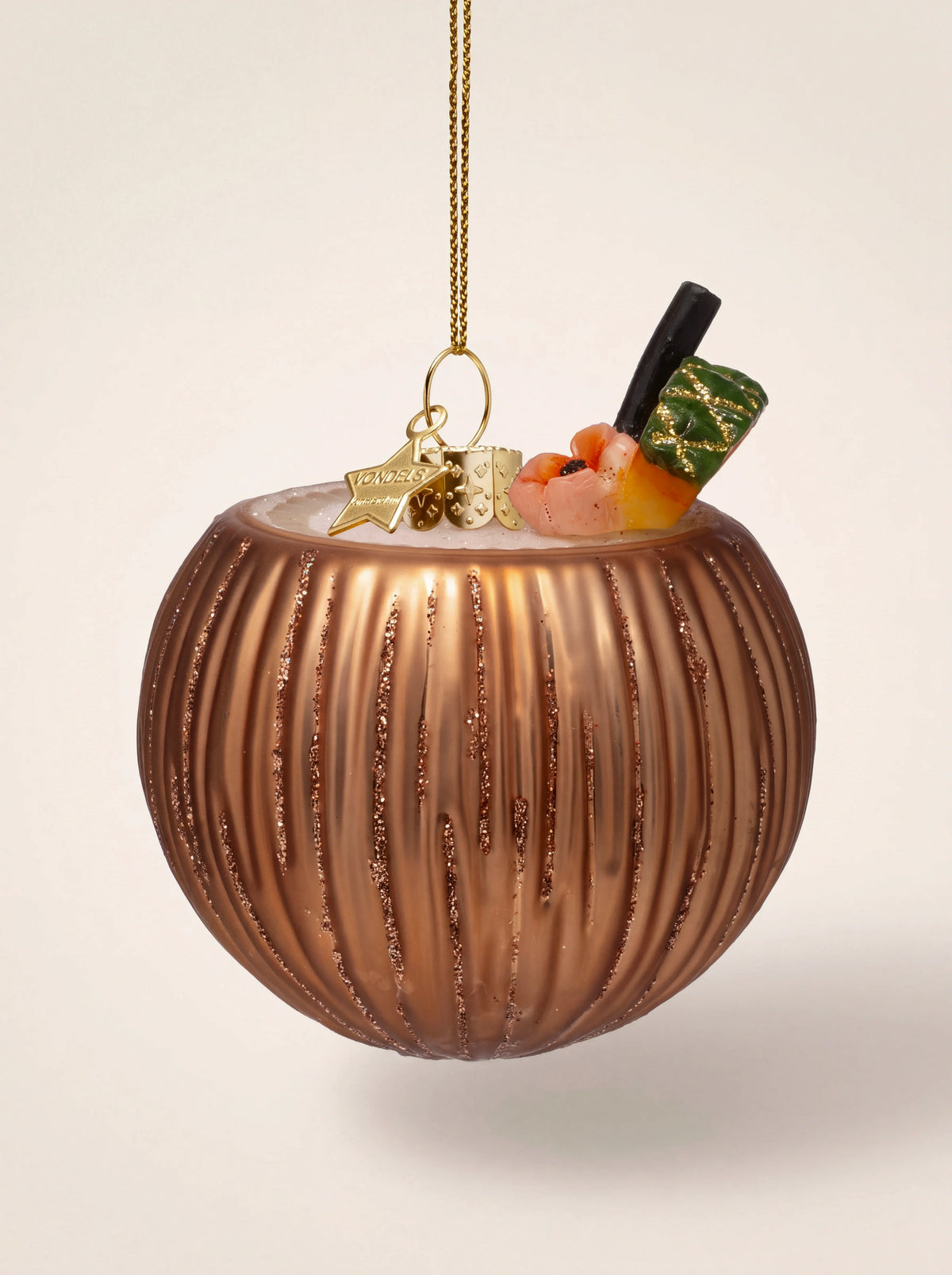 Coconut cocktail glass ornament with brown glitter-ribbed shell, straw, fruit garnish and hanging loop