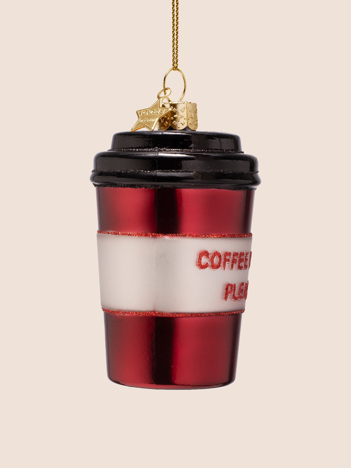 Three-quarter view of the burgundy takeaway coffee cup ornament, showing the curve of the cup and sleeve
