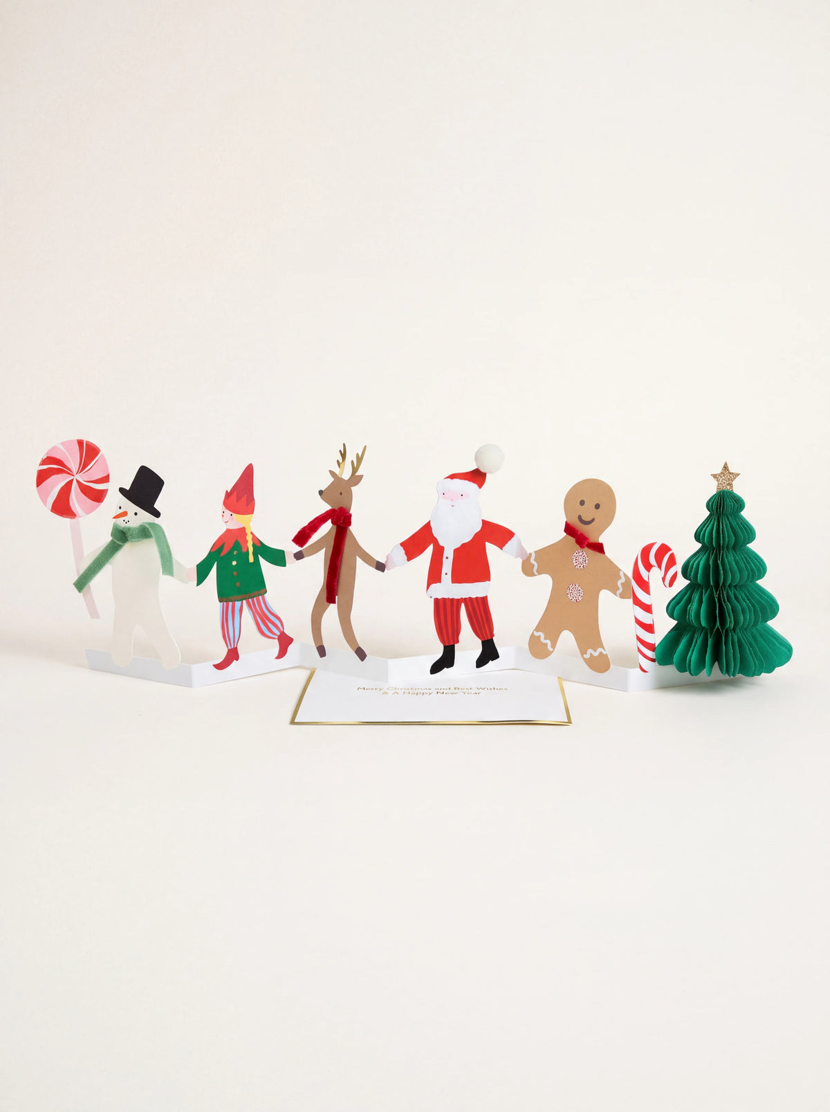 Concertina Christmas card extended with cut-out festive characters and a green honeycomb tree