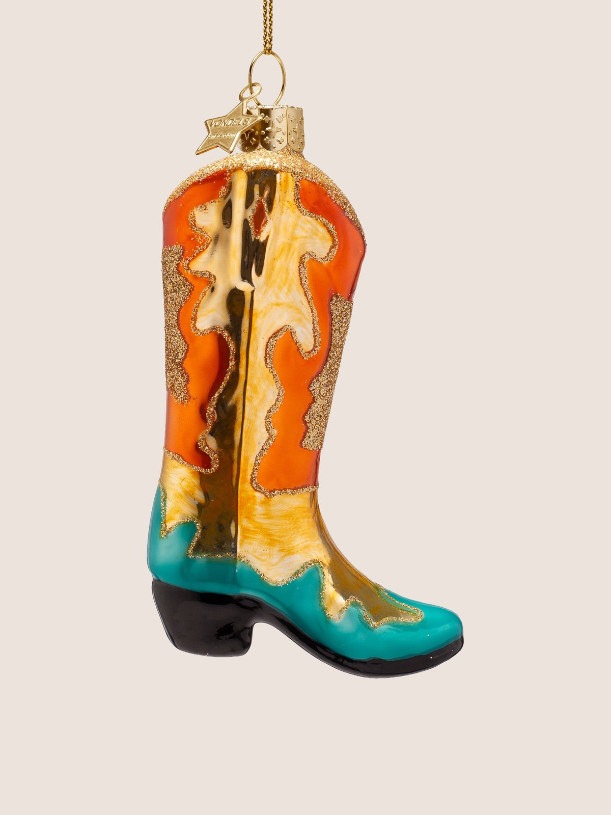 Side profile showing the glitter-edged pattern, turquoise toe and gold star charm