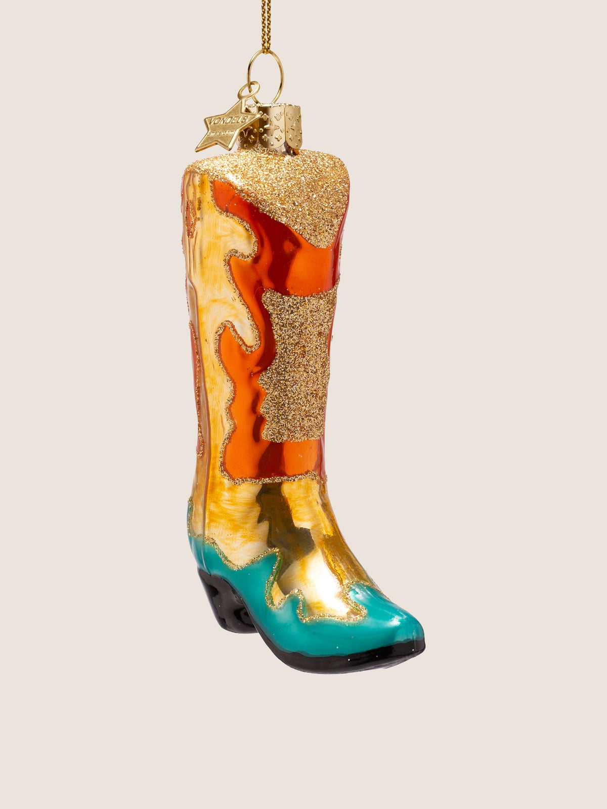 Three-quarter view showing the contoured front shaft, pointed toe and black heel