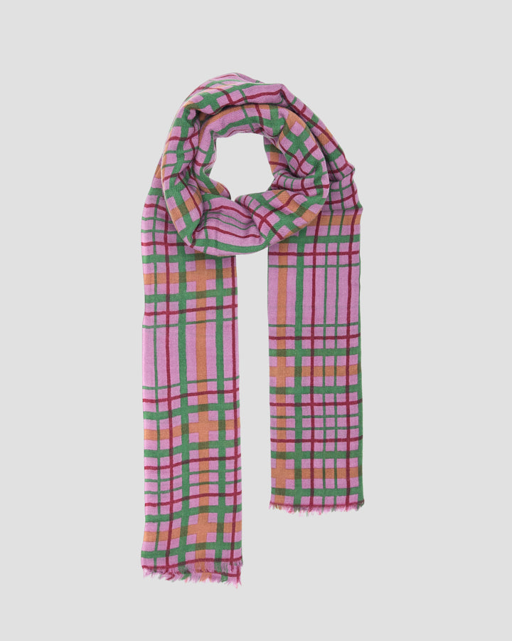 Lilac wool check scarf tied in a loose neck loop with two hanging fringed ends