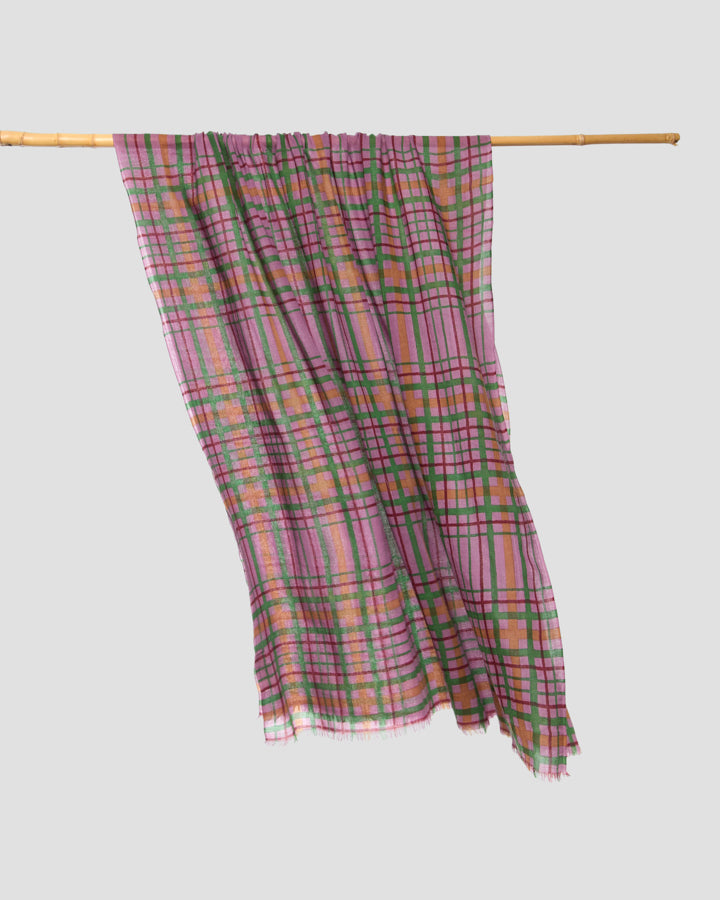 Lilac wool scarf with printed check pattern in khaki, mustard and burgundy, draped with fringed edges