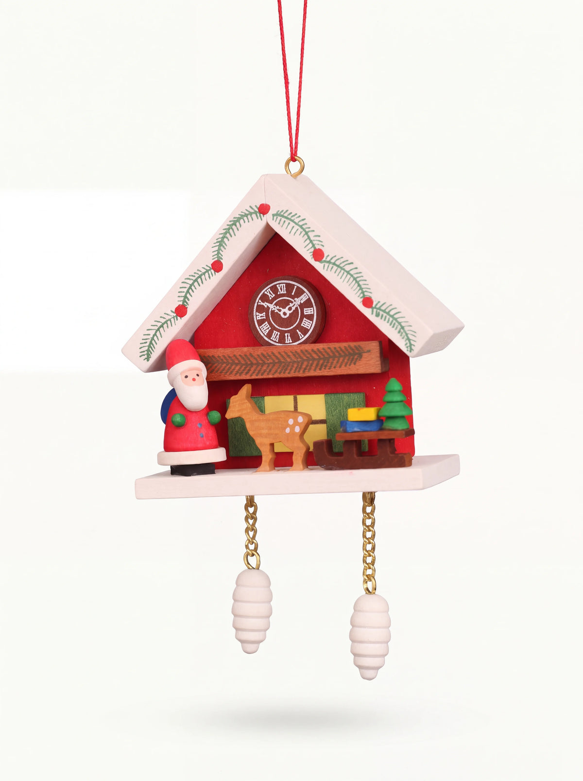 Painted wooden cuckoo clock ornament with Santa, deer, sledge and hanging pine cone weights