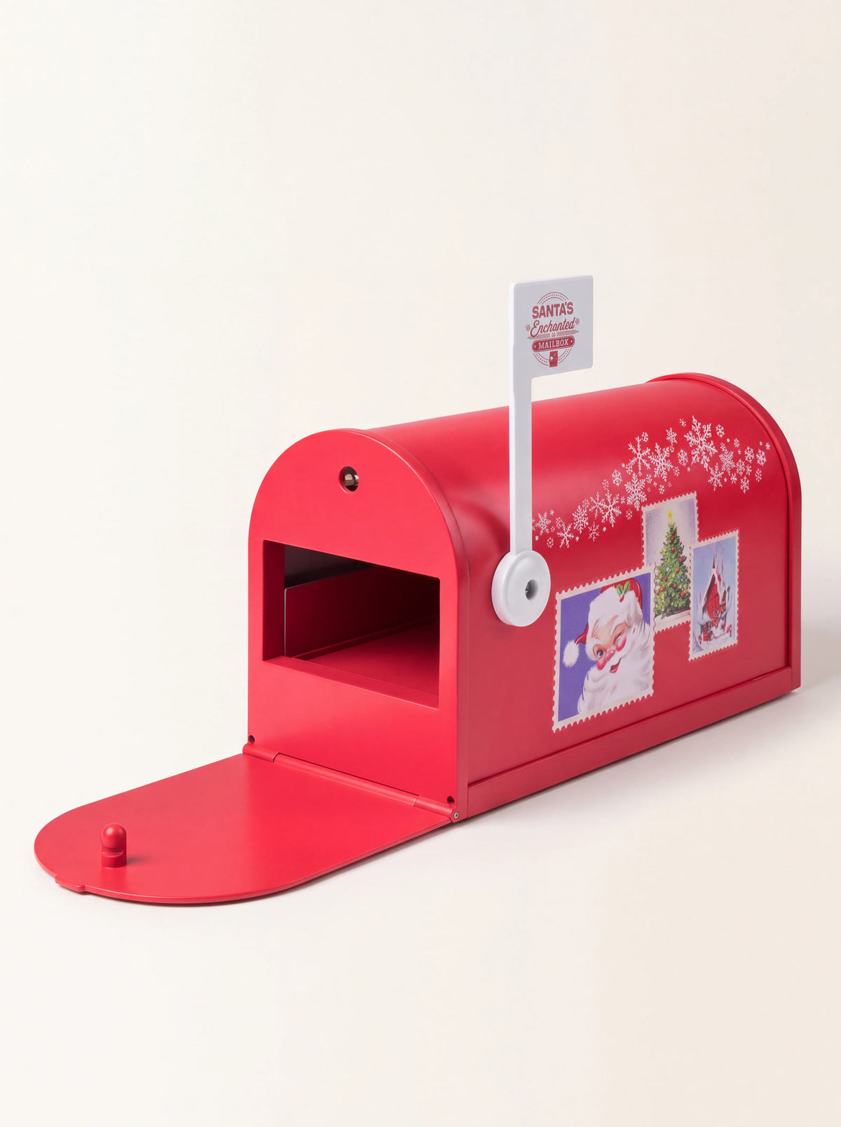 Red arched Christmas mailbox with open door, stamp decals, and raised flag reading Santa's Enchanted Mailbox