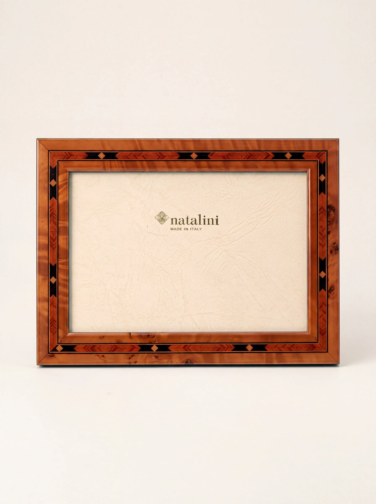 Inlaid wood veneer photo frame in landscape format with geometric diamond border and glossy finish