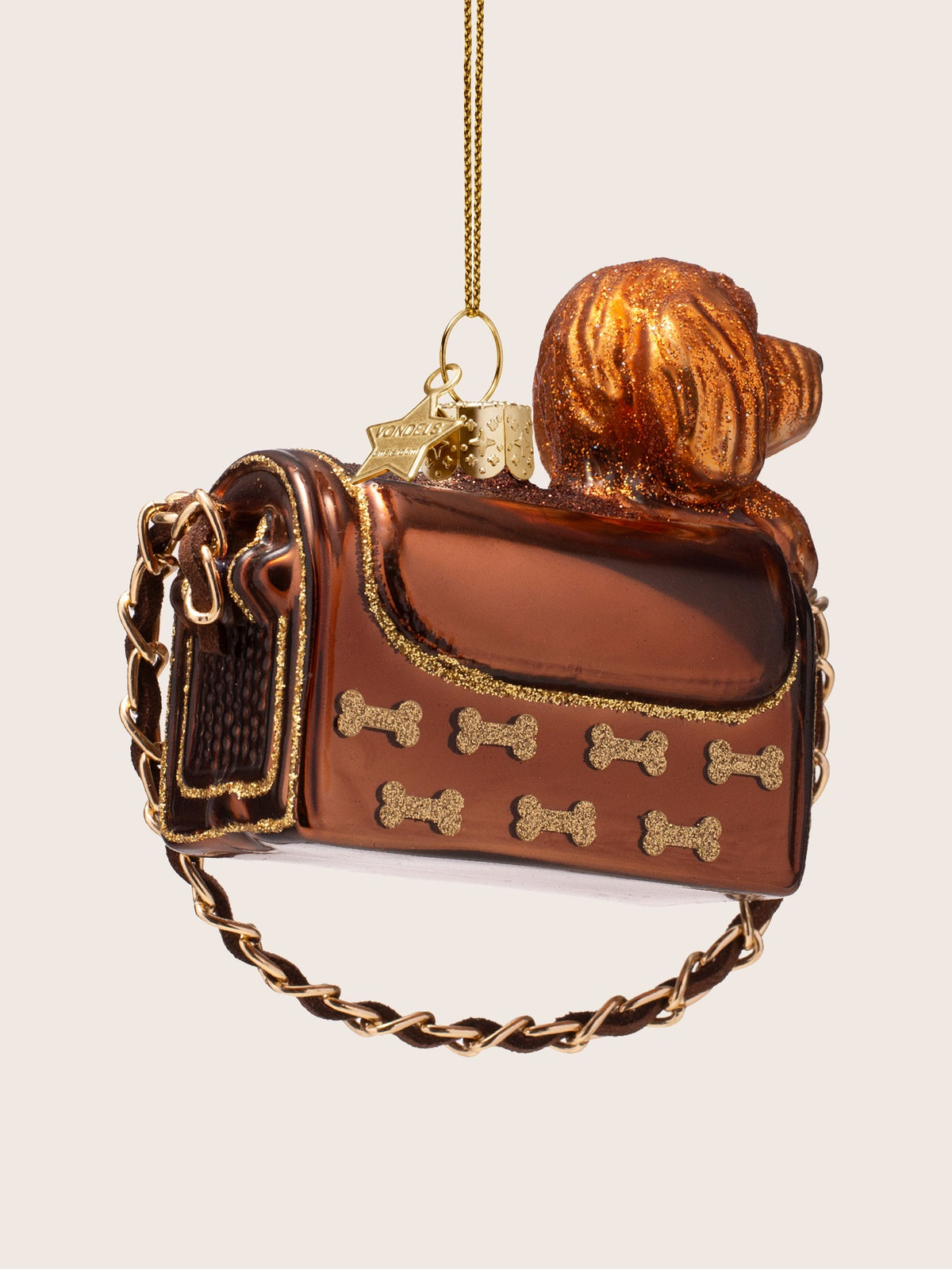 Reverse side of the dog in bag ornament showing the back of the dog and side flap