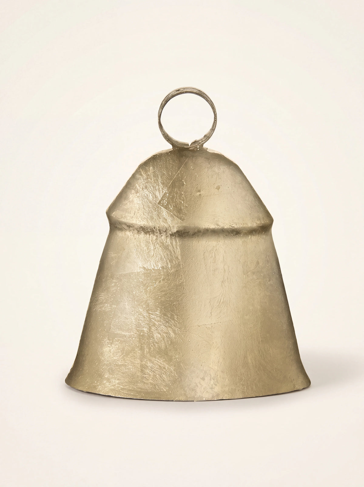 Domed golden iron bell with flared sides and a circular hanging ring