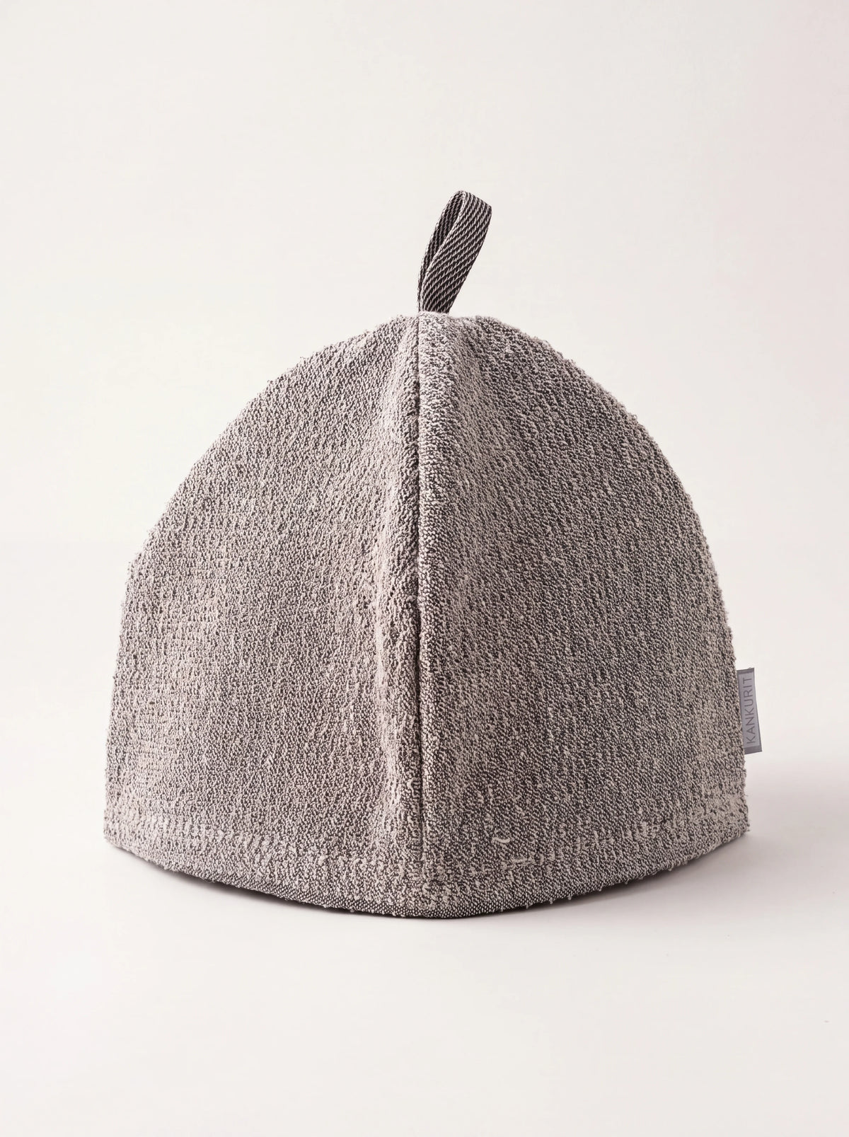 Grey linen terry sauna hat with a domed panelled shape and a striped top hanging loop