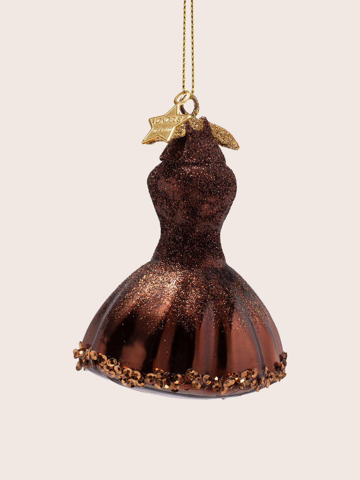 Three-quarter view highlighting the contoured waist and sequinned hem of the glass skirt