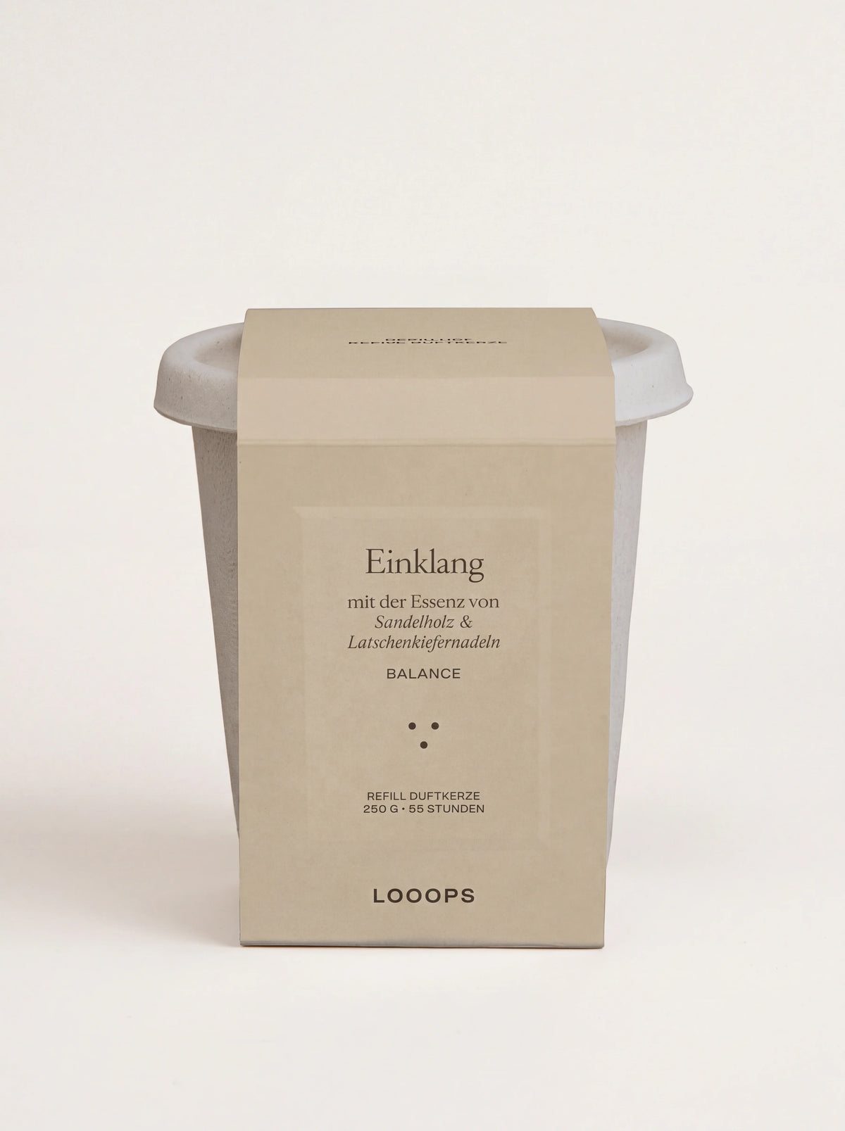 Scented candle refill in a compostable bagasse cup with a beige paper sleeve labelled Einklang