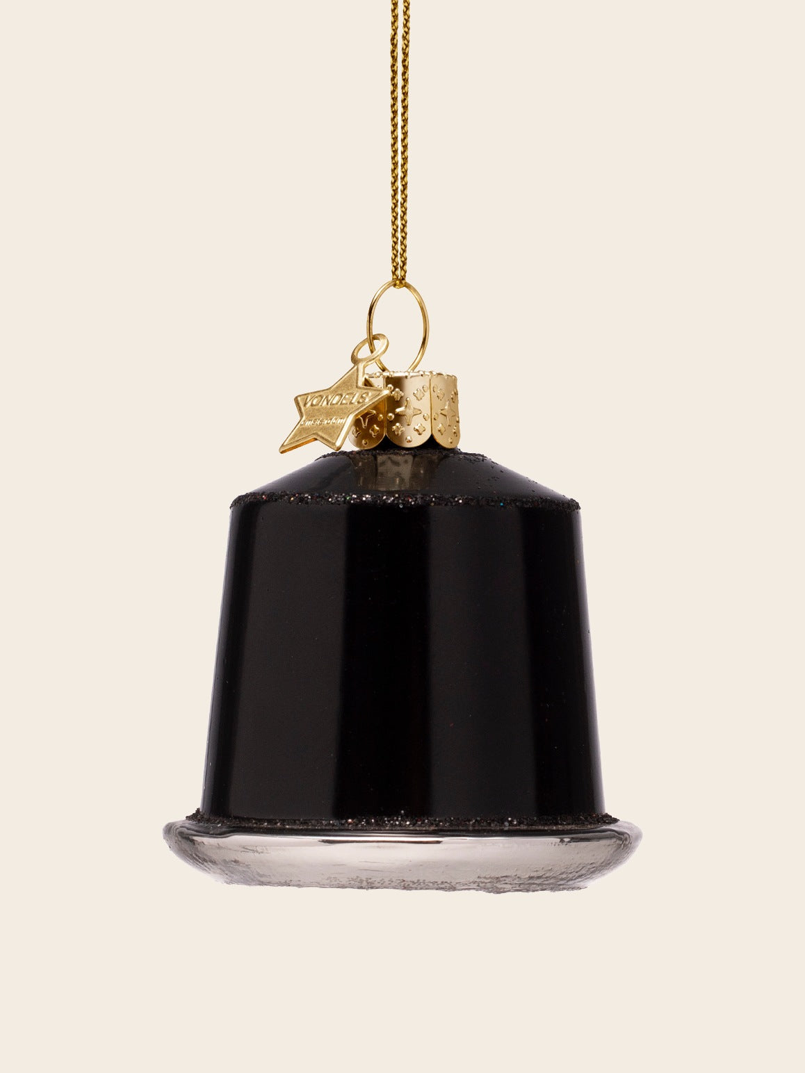 Reverse view of the espresso capsule ornament showing the plain glossy black surface and silver-toned base