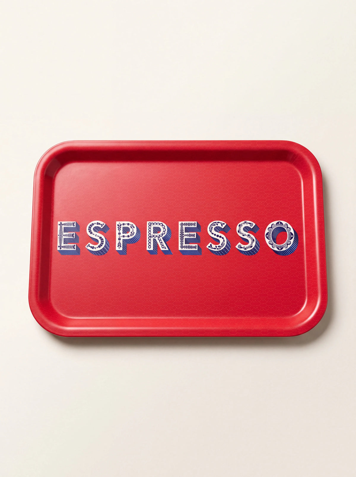 Rectangular red birch wood tray with raised rim and decorative patterned lettering spelling ESPRESSO