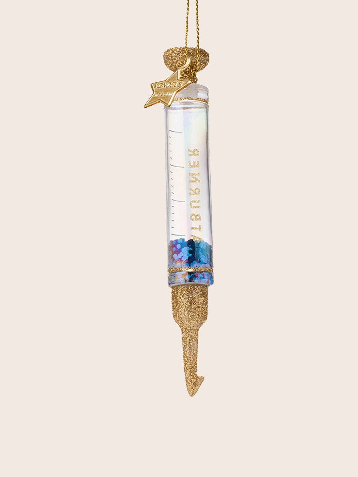 Reverse side of the syringe ornament showing printed measurement markings through the glass