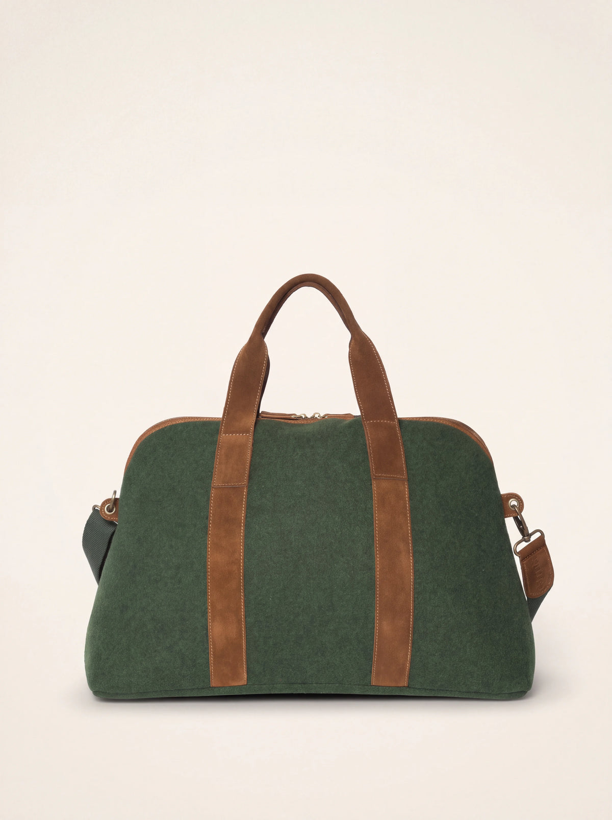 Green wool felt travel bag with brown suede top handles and vertical trim bands