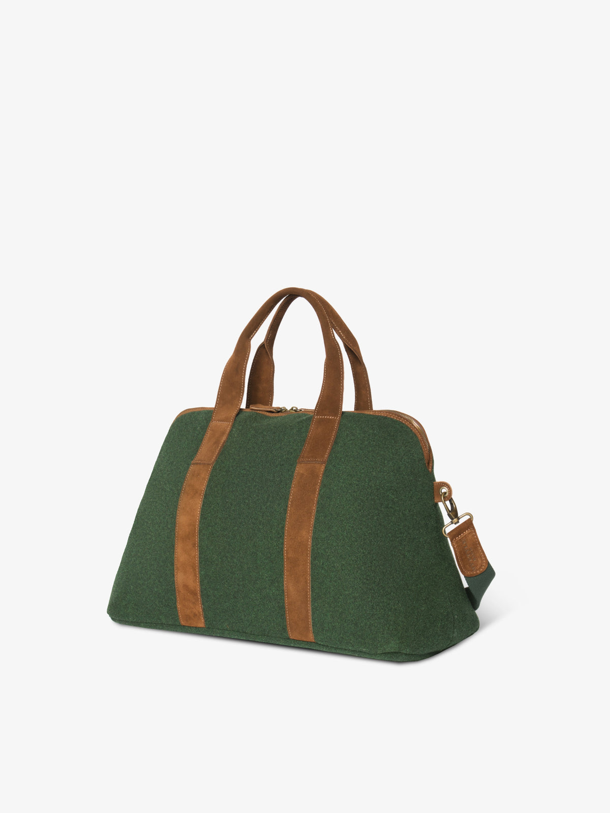Angled view of the green wool felt travel bag showing its depth and tapered side profile