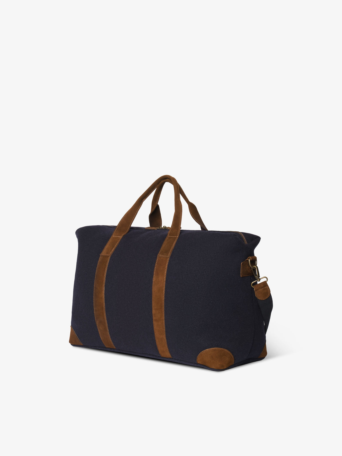 Three-quarter view of the blue felt weekender bag showing the side profile and strap ring