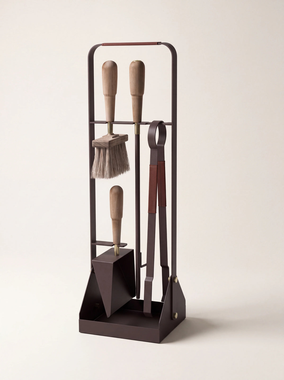 Dark brown powder-coated steel fireplace companion set with walnut-handled brush, poker, shovel and tongs