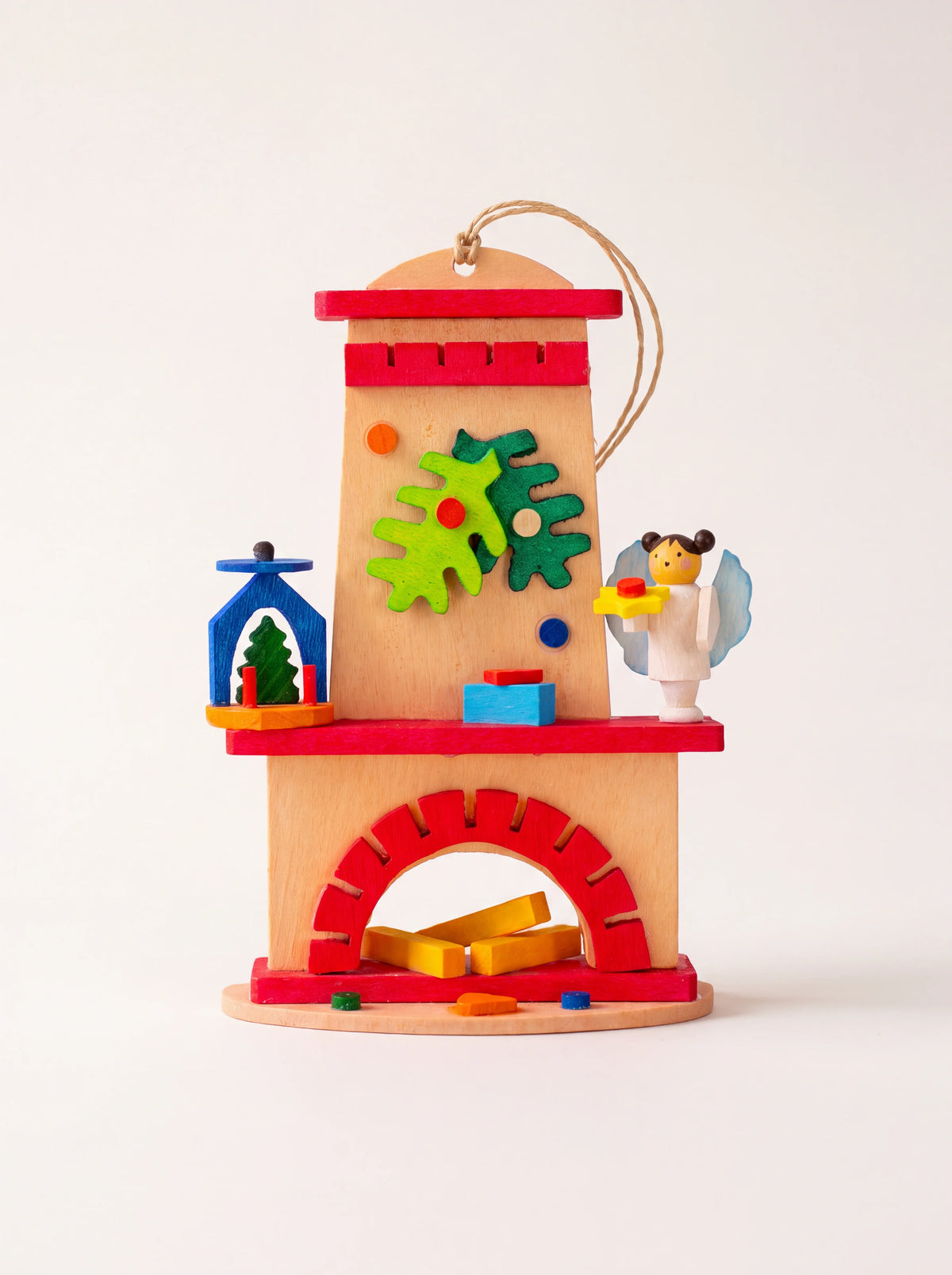 Painted maple wood fireplace ornament with an arched hearth, logs, miniature pyramid and angel figurine