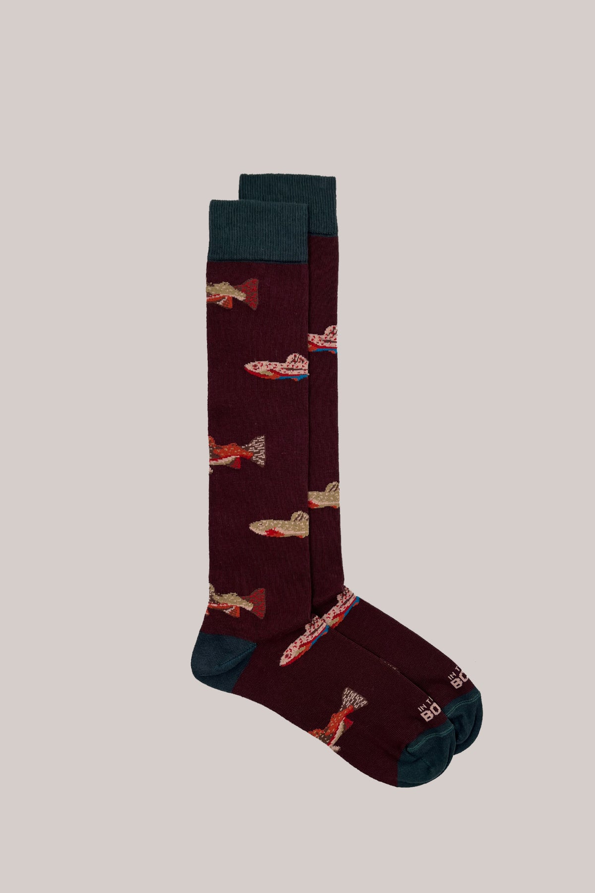 Long brown cotton-blend socks with a fish pattern, dark green ribbed cuffs, heels and toes