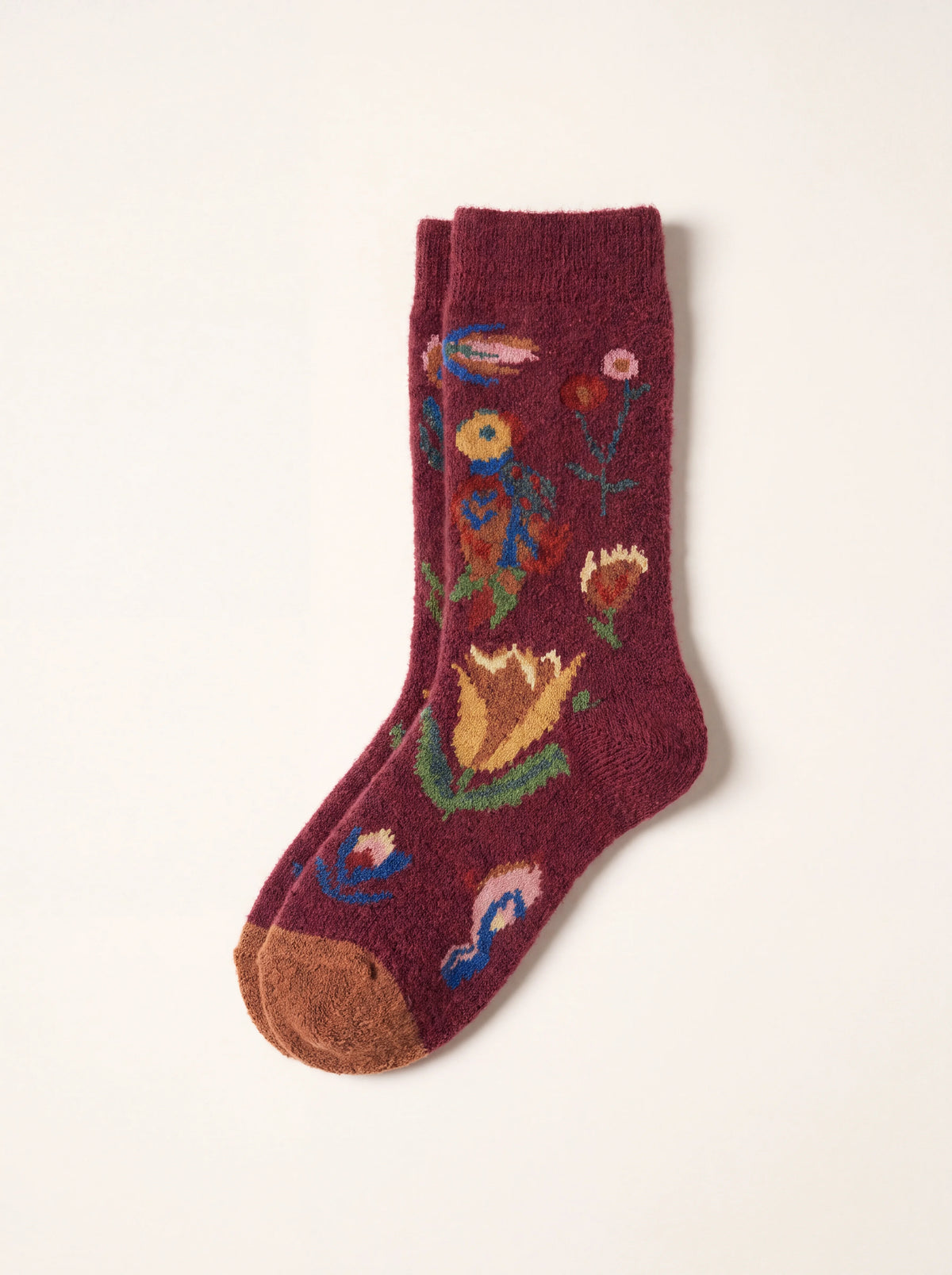 Burgundy wool-blend socks with a colourful floral pattern, ribbed cuffs and contrasting brown toes