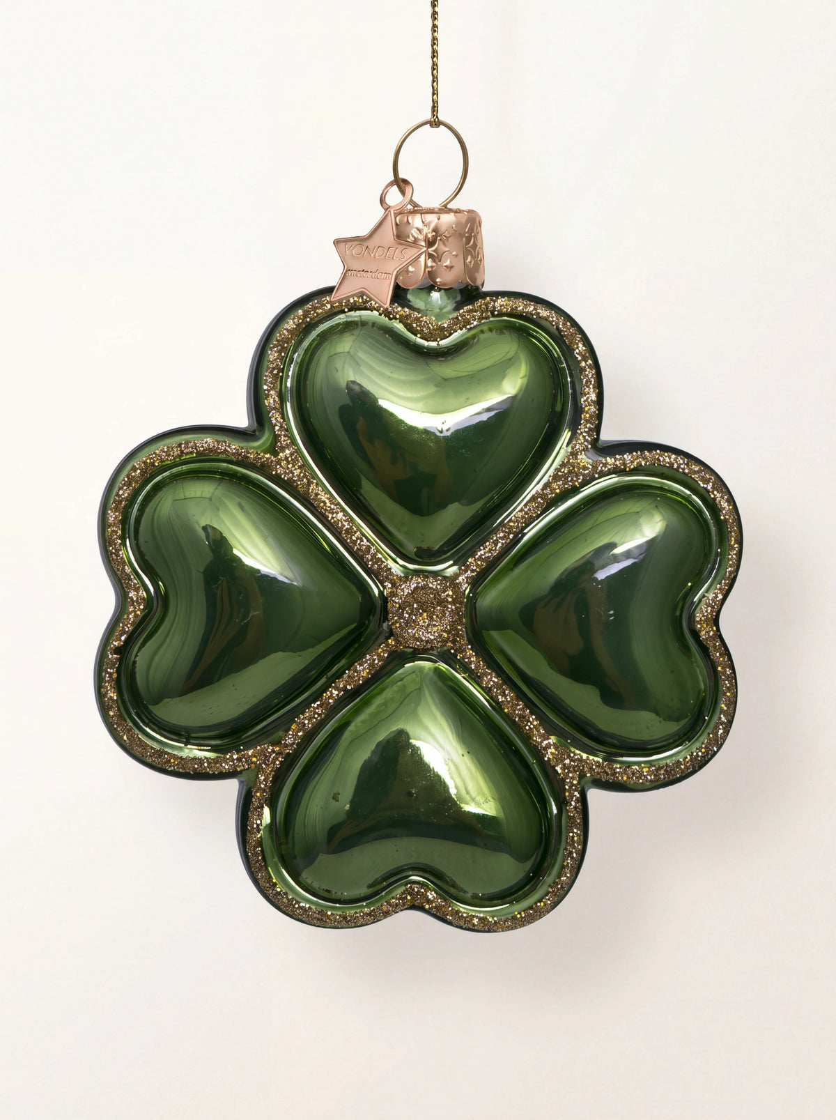 Glossy green four-leaf clover glass ornament with gold glitter borders and a hanging loop