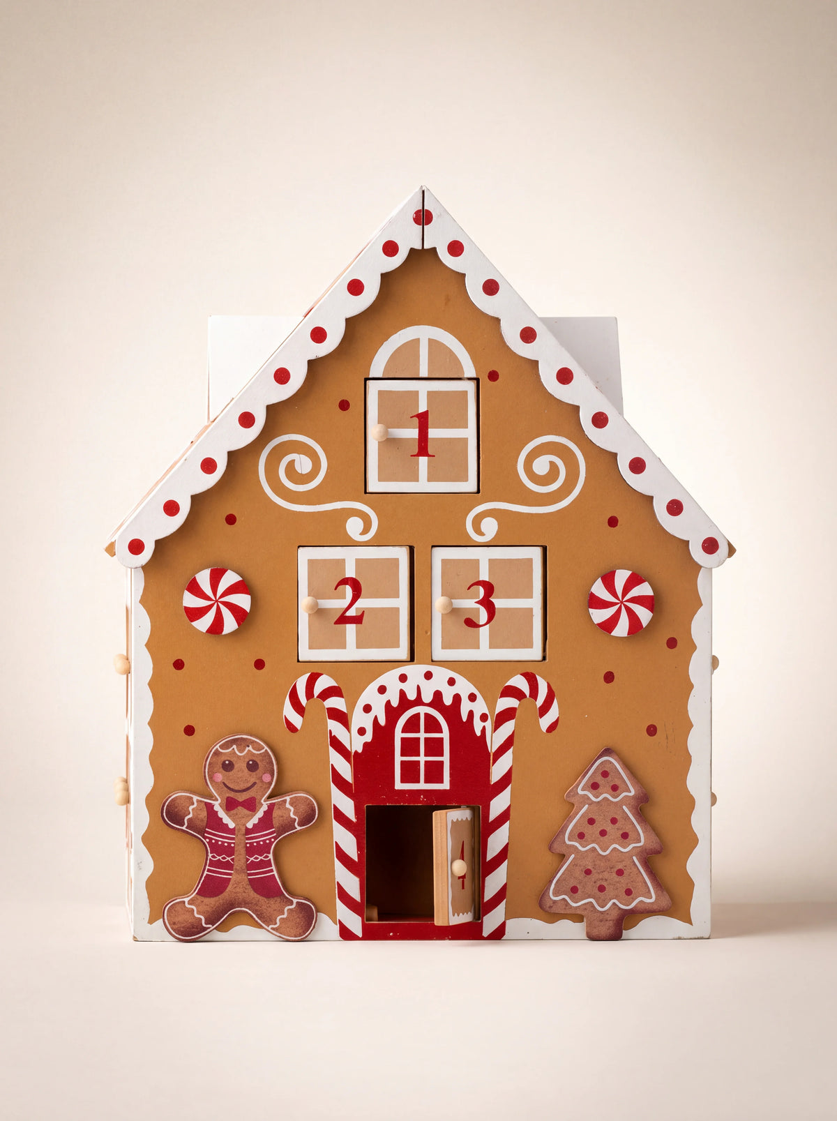 Front of the gingerbread house Advent calendar showing the numbered door 4 swung open
