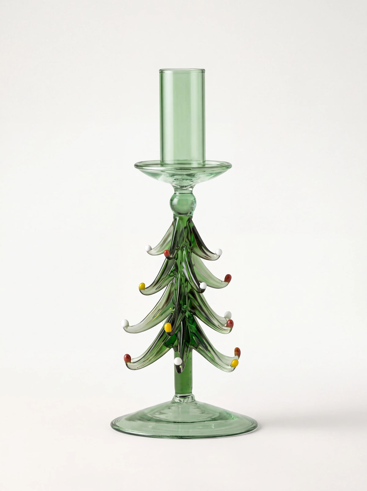 Green glass Christmas tree candle holder with tiered branches, multicoloured tips and a round base