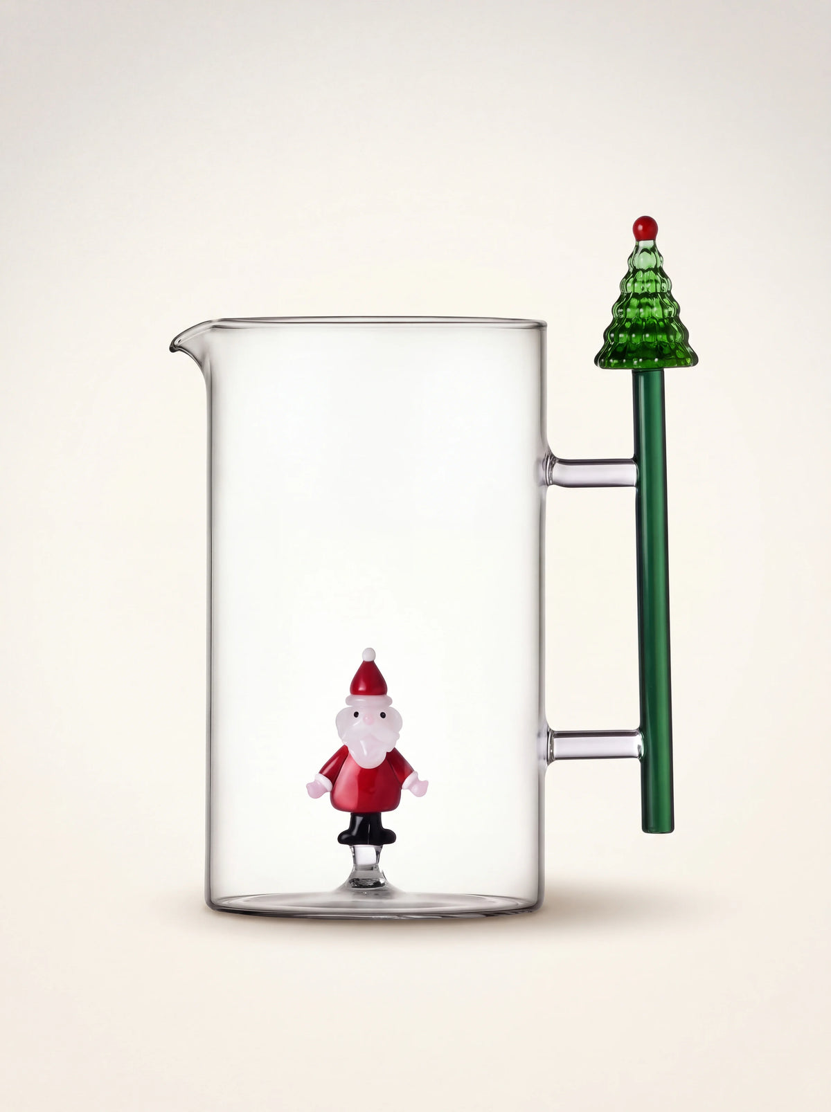 Clear borosilicate glass jug with an integrated Santa figure inside and a green Christmas tree handle