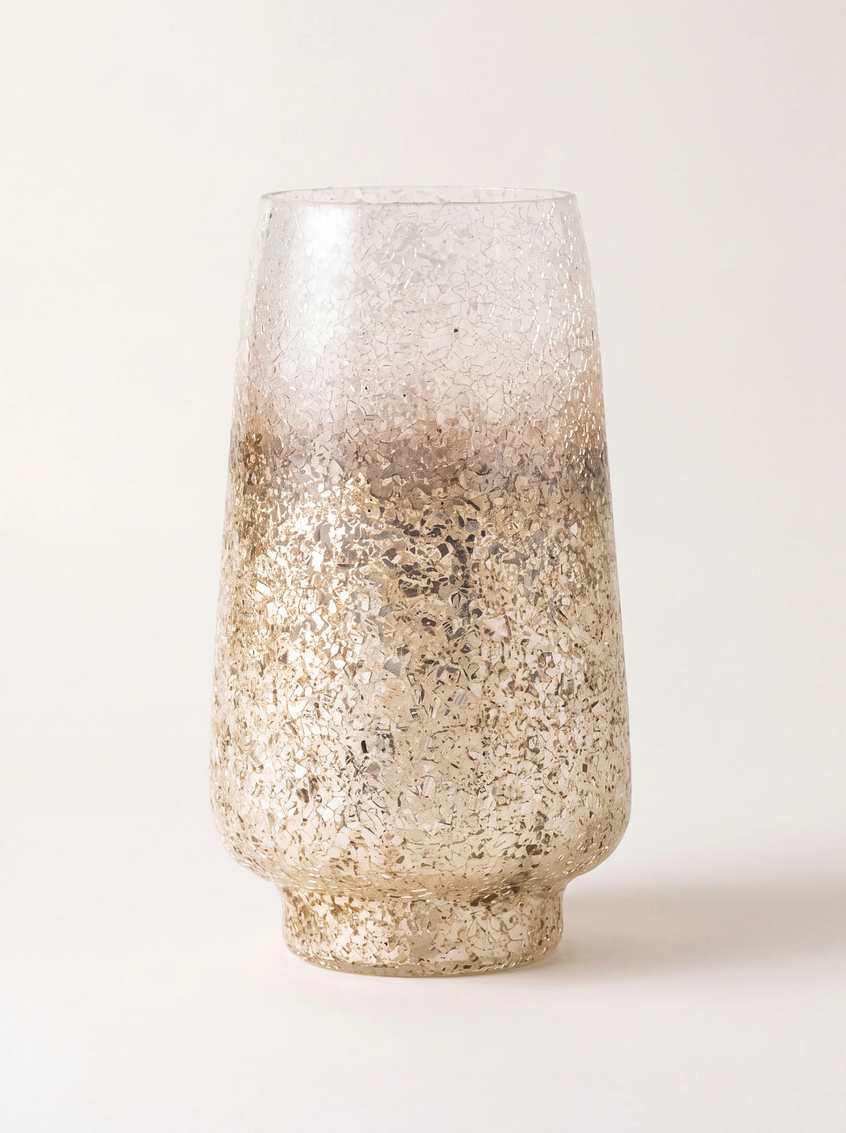 Glass tealight holder with a tapered cylindrical shape and crackled silver finish